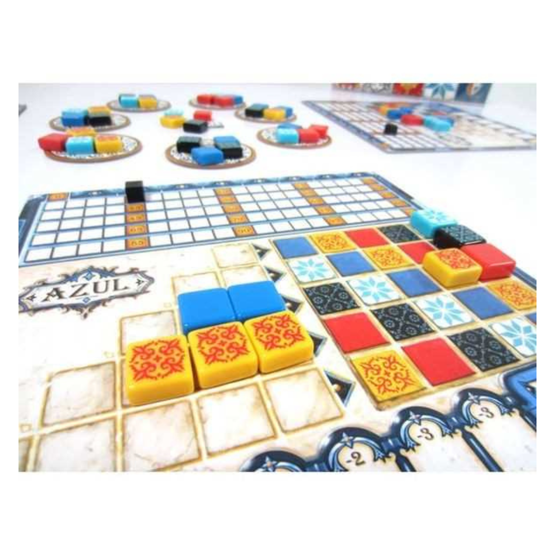 A picture of some components from the Azul boardgame